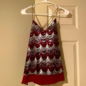 Worn once. Tank style M sparkly. Lined